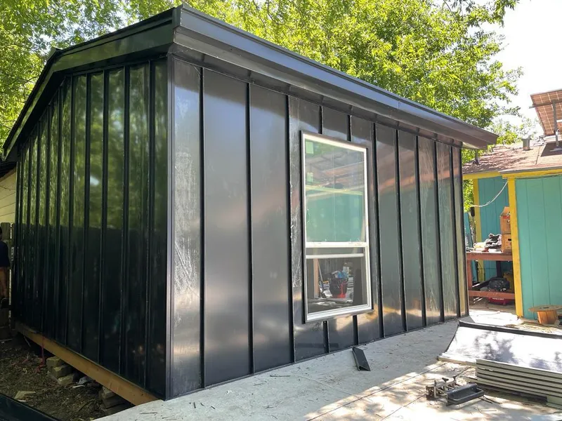 Black standing seam metal wall panels for Roof Inspection in New Fairfield