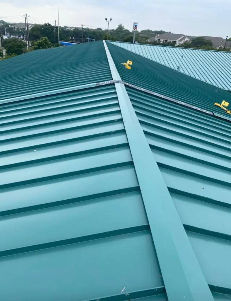 Green commercial metal roof ridge and valley for Metal Roof Repair in New Fairfield
